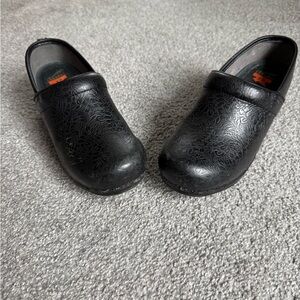 Dansko Black Floral Embossed Mules